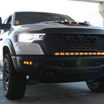 RAM RHO FOG on RAM 1500 RHO 2025+ front view with factory bolt-on fit, black powder-coated brackets, no cutting required (RAM RHO FOG)