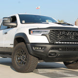 RAM RHO FOG light kit installed on 2025 RAM 1500 RHO model shown; bolt-on, no drilling, powder-coated black brackets, replaces factory fog lights (Driver and Passenger sides)