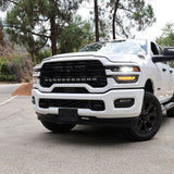 2025+ RAM 2500 light bar 40in PRO curved LED installed on white RAM 2500 truck front view on mountain road