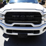 2025+ RAM 2500 light bar slim 40in curved LED grille mount on white RAM 2500 front view