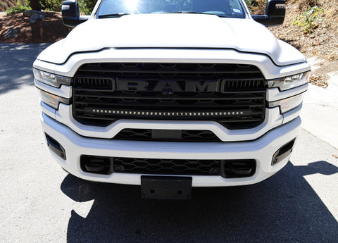 2025+ RAM 2500 light bar slim 40in curved LED grille mount on white RAM 2500 front view