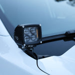 LED ditch light pod mounted at the hood corner of a Ford Ranger for off-road visibility