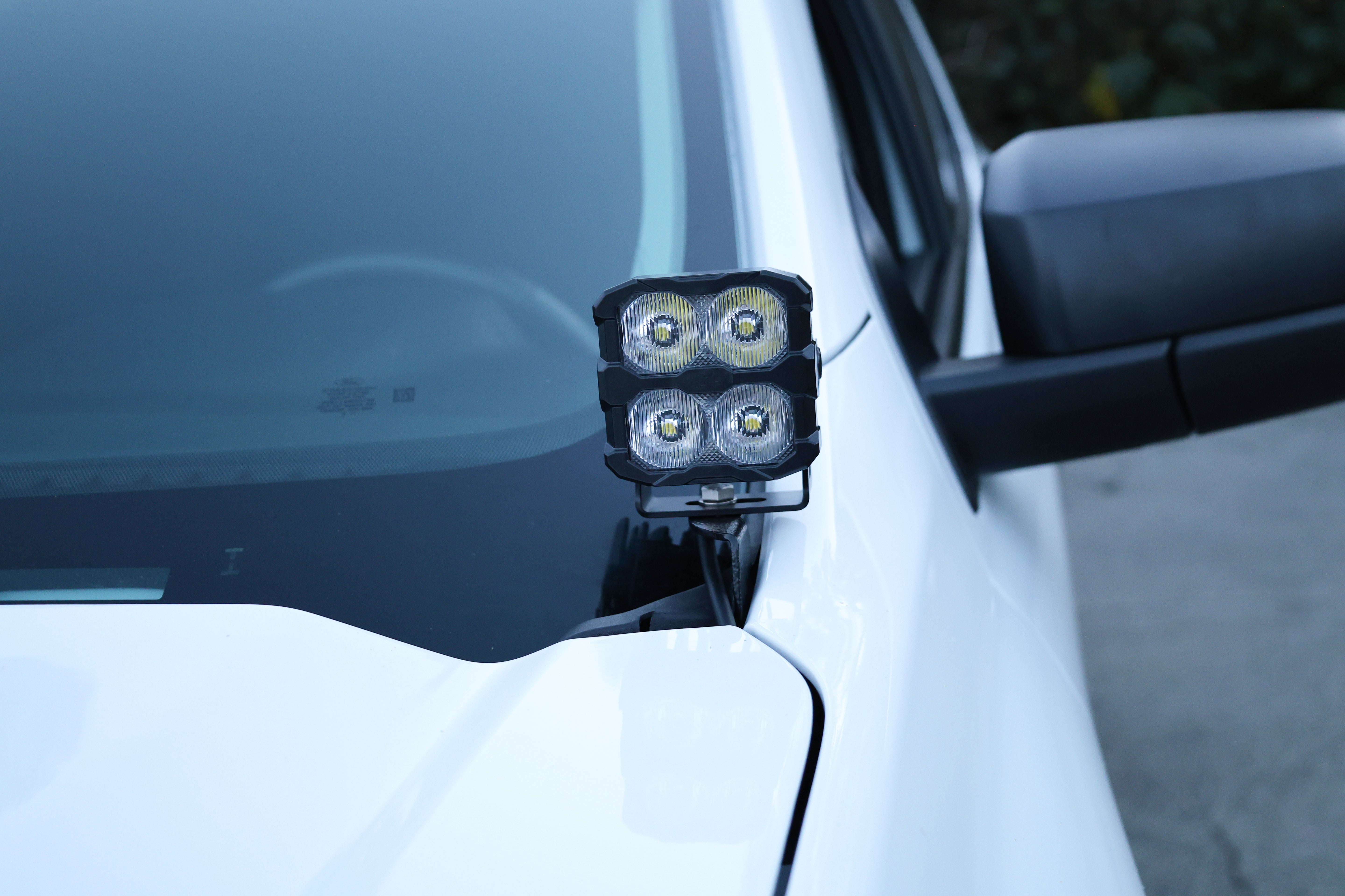 Adjustable Ford Ranger Ditch Lights PRO pod on a white truck