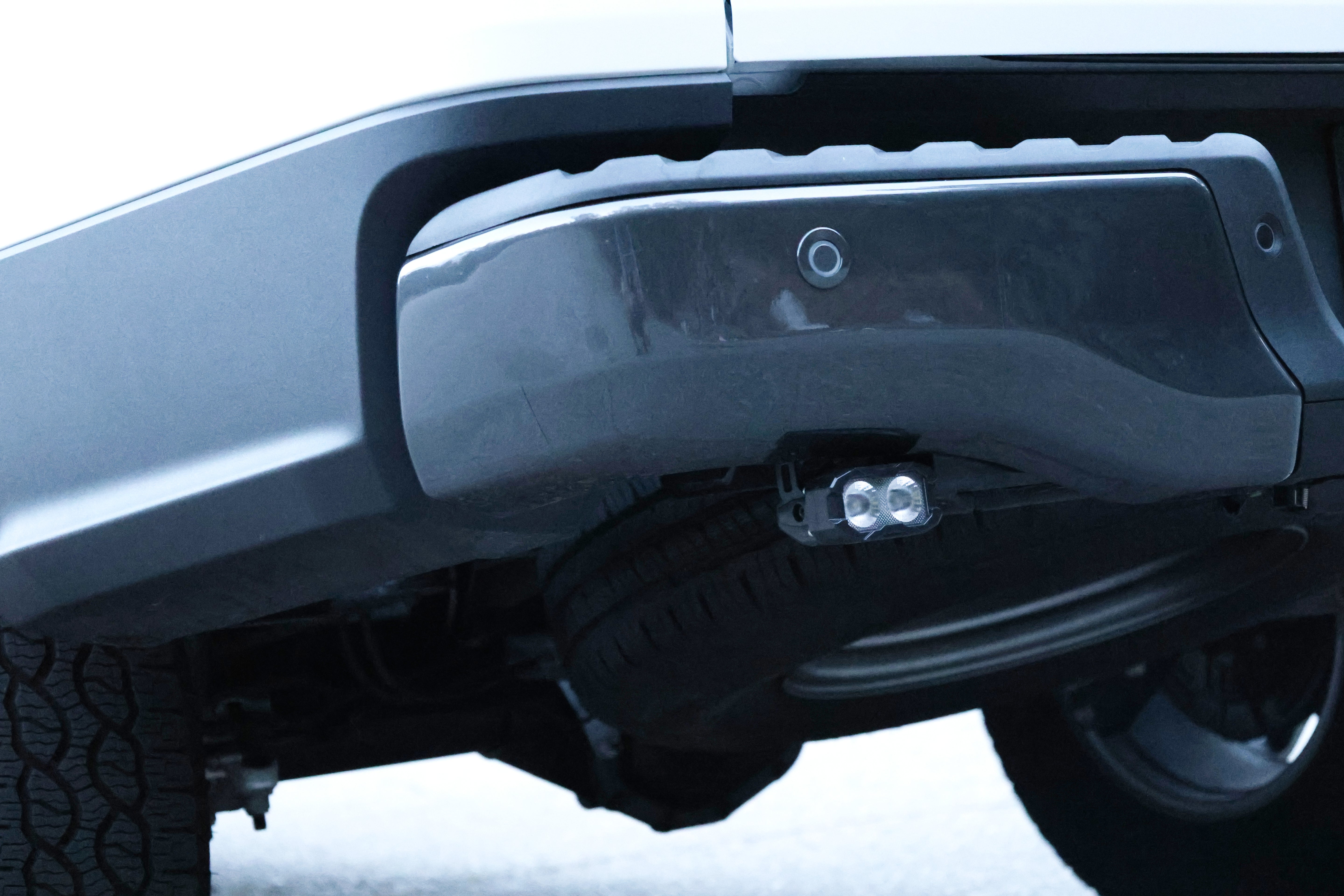 Close-up of the paired LED reverse light pods on a Ford Ranger rear bumper
