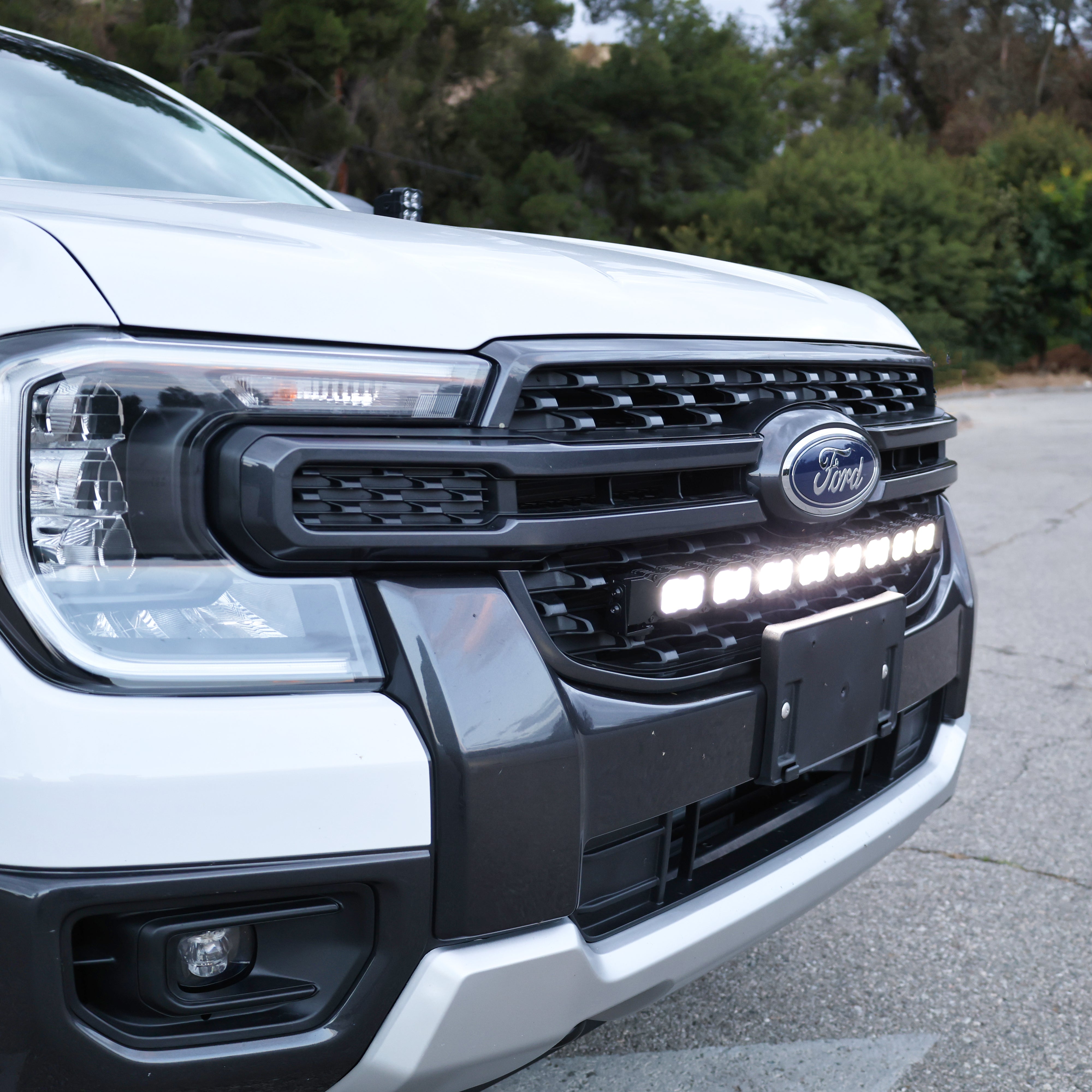 Detail of the Ford Ranger 30-inch PRO LED light bar seated in the factory grille opening