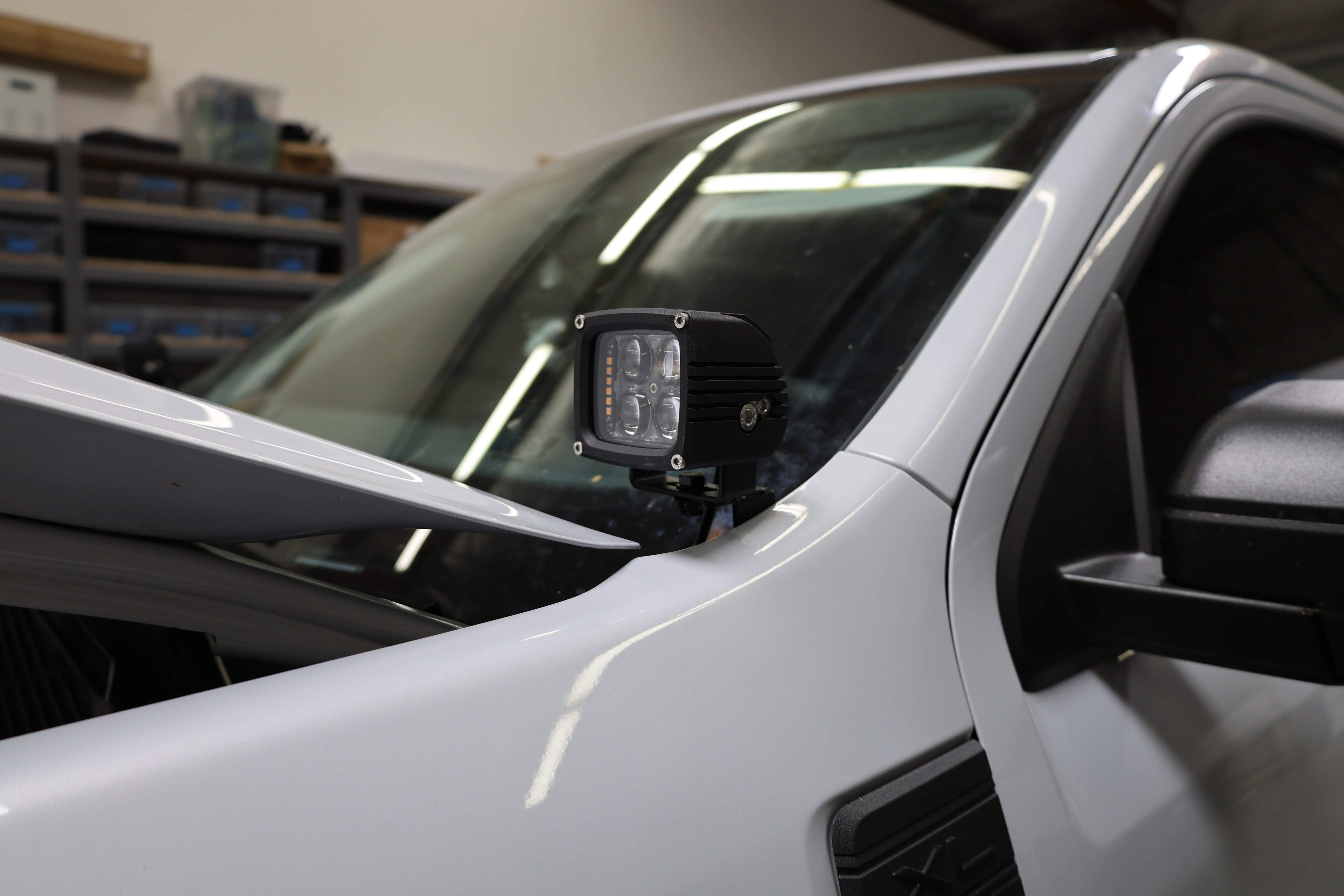 Ford Maverick Ditch Lights dual color LED ditch light pod mounted on 2025 Ford Maverick hood near windshield