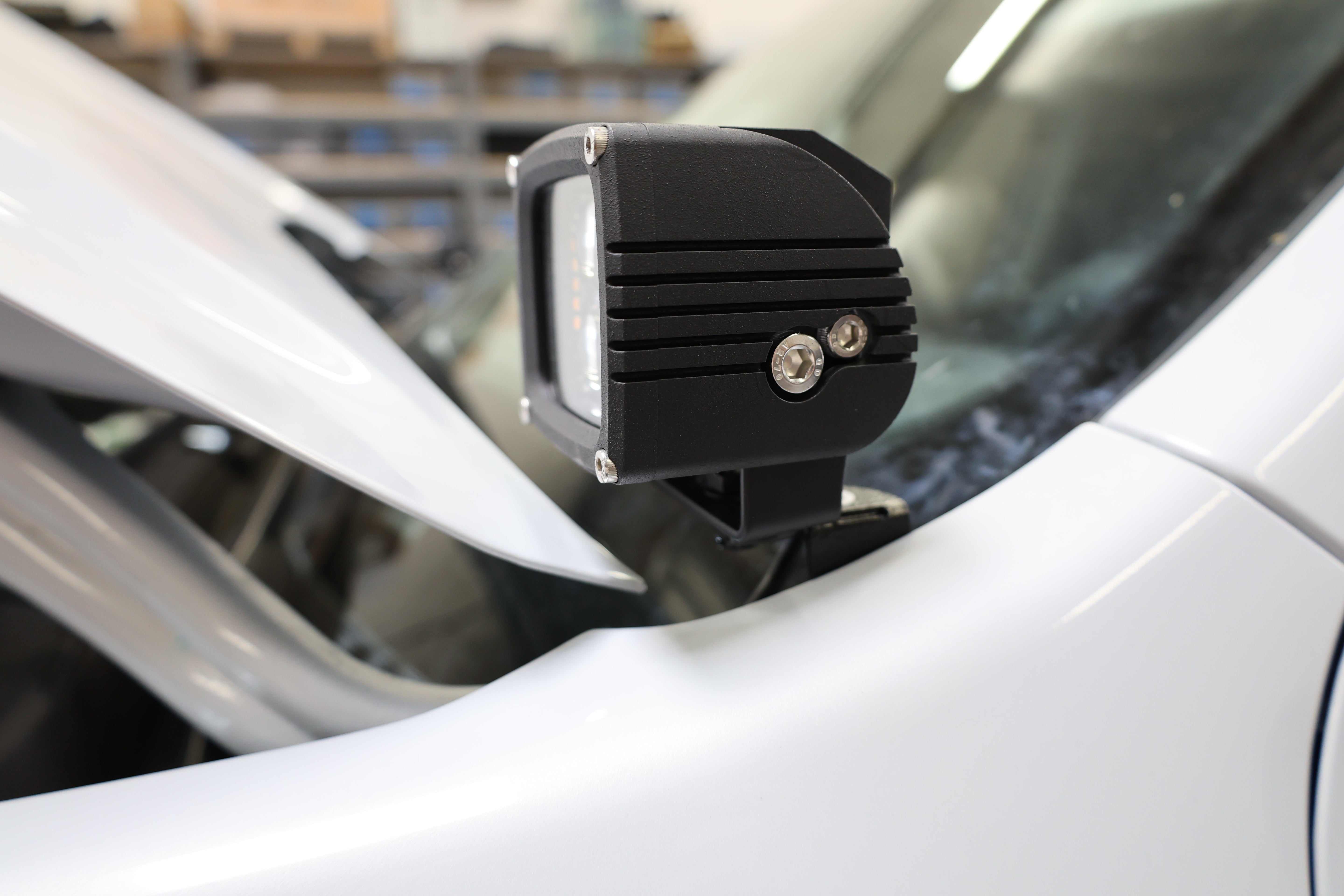 Ford Maverick Ditch Lights 2025+ dual color LED ditch light pod mounted on hood near windshield