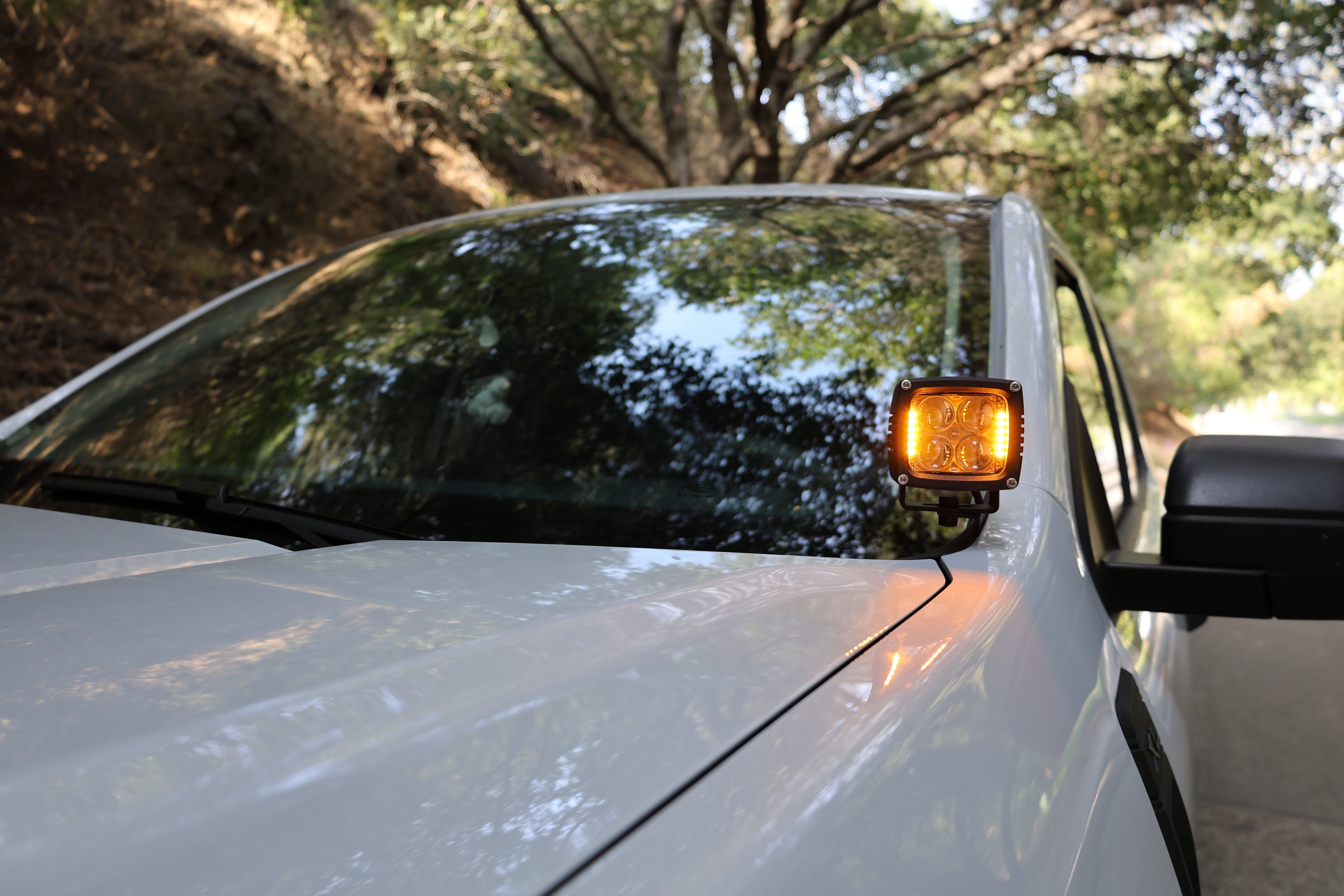Ford Maverick Ditch Lights dual color amber DRL mounted near windshield on white 2025 Maverick XL XLT Lariat