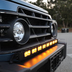 Ineos Grenadier 30in light bar slim black bracket mounted along the top of the front bumper, daylight