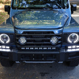 2024+ Ineos Grenadier front view with XL light bar kit mounted and unlit, 30in center bar and two 12in extensions