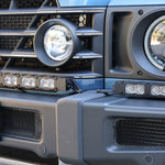 Close-up of the Ineos Grenadier XL light bar kit unlit, showing TIR LED cubes where the 30in and 12in bars meet
