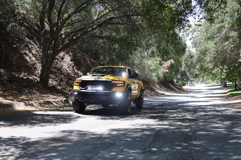 yellow ram trx 2025 with m&R automotive off roading lights