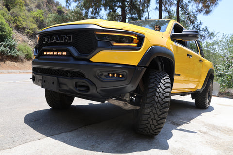 2022 yellow ram trx with m&r automotive off road ditch lights light bar and fog lights for off roading