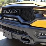 RAM TRX Lightbar 23in PRO mounted between grille and bumper on yellow 2021-2024 RAM 1500 TRX front view