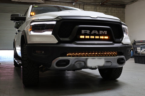 white 2025 ram 1500 rebel with light bar for off roading m&R automotive