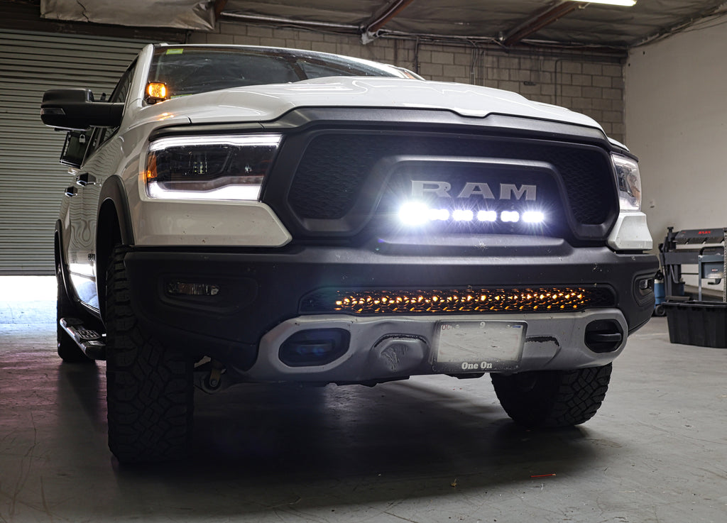 white 2020 ram 1500 rebel with light bar for off roading m&R automotive