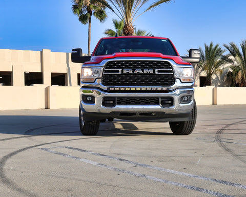 2023 red Ram 2500 HD with LEd light bar on top of bumper for off roading 