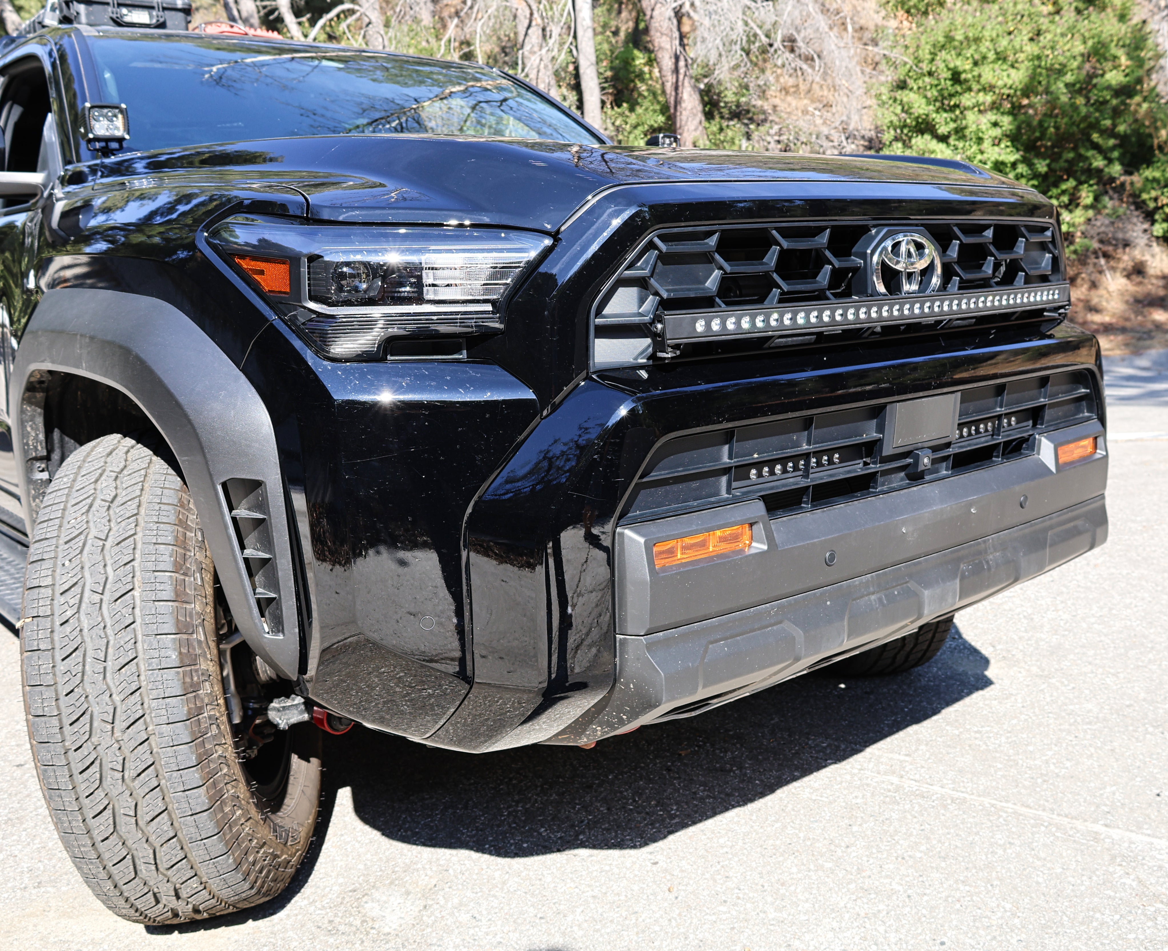 4Runner Light Bars installed on black Toyota 4Runner front grille, showcasing sleek 11in slim LED light bar upgrade