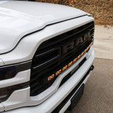 2025+ RAM 2500 light bar PRO curved 40in LED integrated in front grille on white RAM 2500 truck