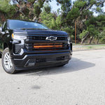 Black Chevrolet Silverado 1500 dual 40in LED light bars, close-up of grille mount