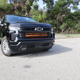 Black Chevrolet Silverado 1500 dual 40in LED light bars, close-up of grille mount