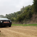 Black Chevrolet Silverado 1500 dual 40in LED light bars behind the front grille