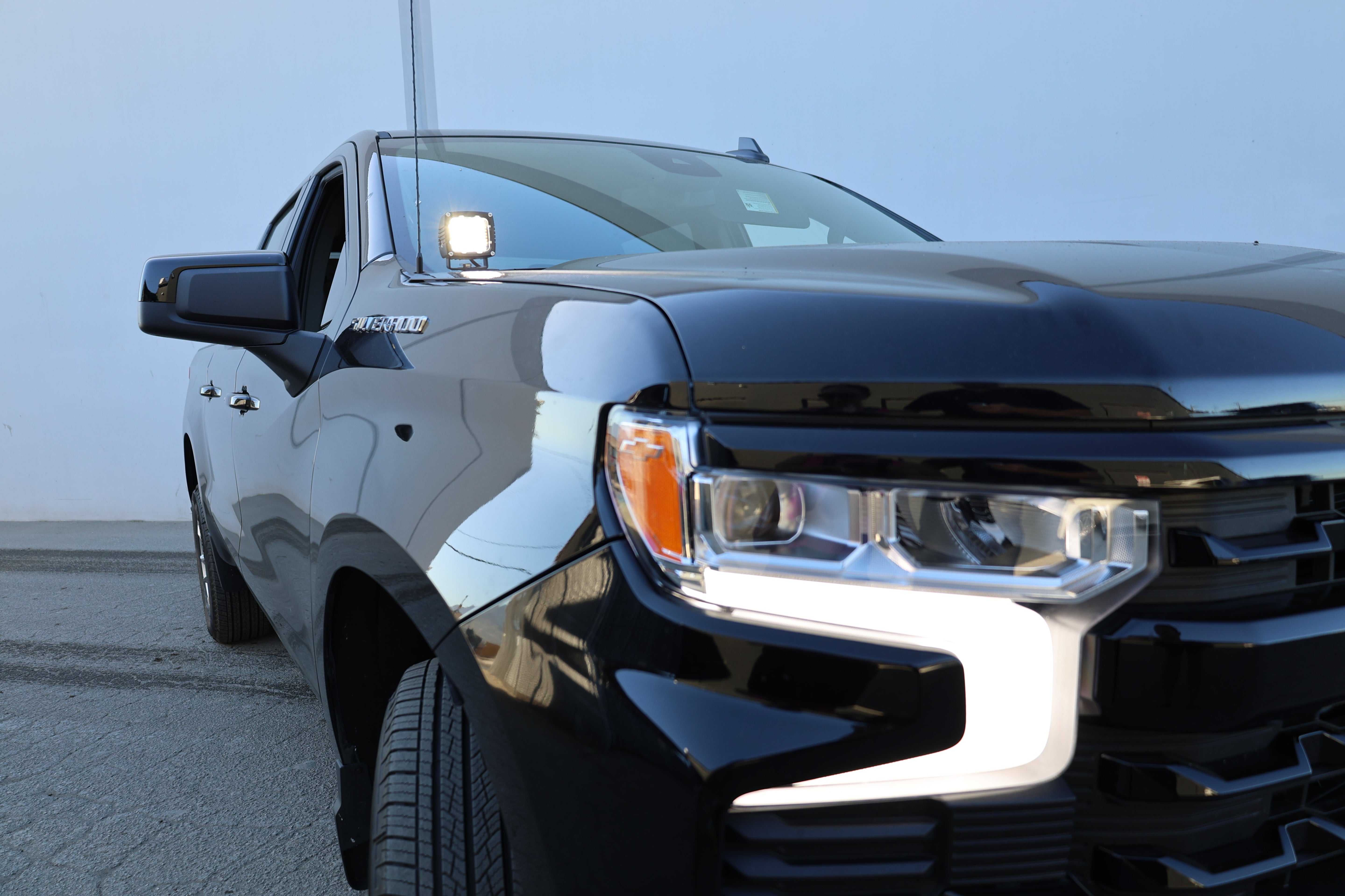 Silverado 1500 ditch lights installed on 2022+ Chevrolet Silverado front driver side view