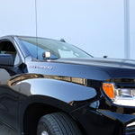 Silverado 1500 ditch lights installed on black 2022 Chevrolet Silverado 1500 front fender, close-up of dual color LED pods