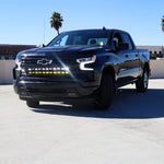 Silverado 1500 ditch lights PRO dual color LED on 2022 Chevrolet Silverado 1500 front view in daylight parking lot