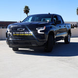Silverado 1500 ditch lights PRO dual color LED on 2022 Chevrolet Silverado 1500 front view in daylight parking lot