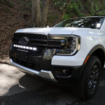 Ford Ranger Ditch Lights PRO installed on a white Ford Ranger, hood-corner mount