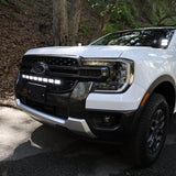 Ford Ranger Ditch Lights PRO installed on a white Ford Ranger, hood-corner mount