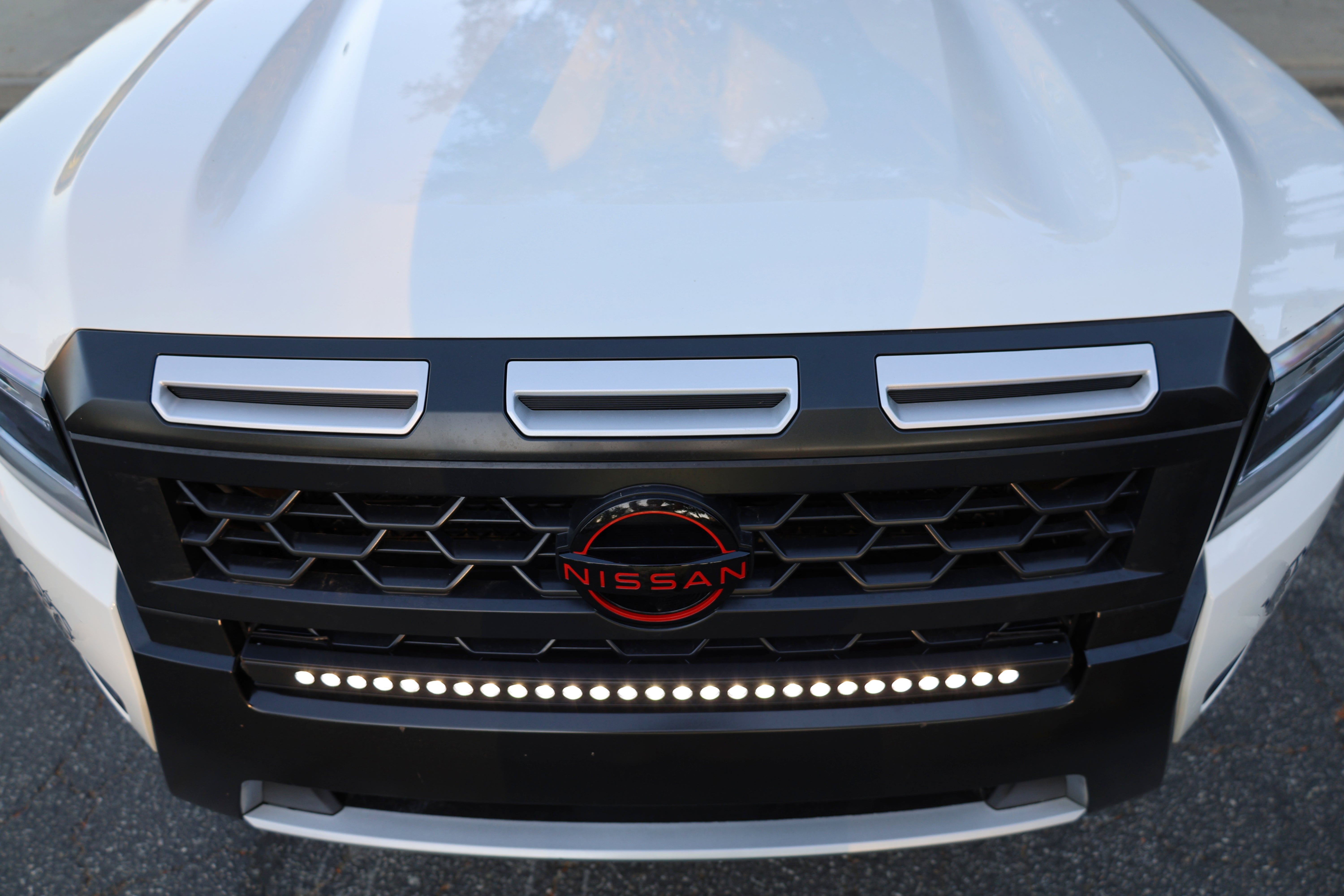 2025+ Nissan Frontier single 30in SLIM LED light bar, front grille detail