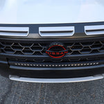 White 2025+ Nissan Frontier fitted with the 30in SLIM grille LED light bar, front view