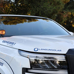 2025+ Nissan Frontier hood-mounted LED ditch lights with amber DRL backglow