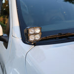 2025+ Nissan Frontier Ditch Lights PRO mounted on white truck with LED lights for enhanced visibility.
