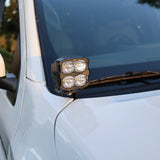 2025+ Nissan Frontier Ditch Lights PRO mounted on white truck with LED lights for enhanced visibility.