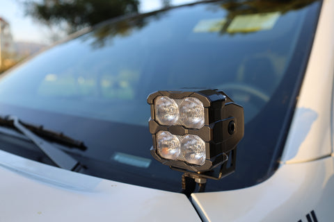 2025+ Nissan Frontier Ditch Lights PRO with dual color white LED and amber DRL, installed on a vehicle.