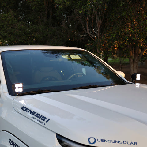 2025+ Nissan Frontier Ditch Lights PRO showcased on a white vehicle with dual color LED lights for enhanced visibility.