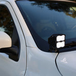 2025+ Nissan Frontier Ditch Lights PRO mounted on vehicle, showcasing bright white LEDs and amber DRL for enhanced visibility.