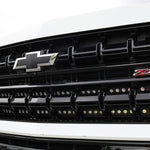 2025 Chevrolet Suburban front grille with Z71 badge and installed Suburban Light Bars