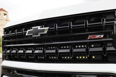 2025 Chevrolet Suburban front grille with Z71 badge and installed Suburban Light Bars