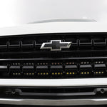 Front view of a Chevrolet Suburban with dual light bars installed, showcasing the grille and lighting functionality for Suburban Light Bars.