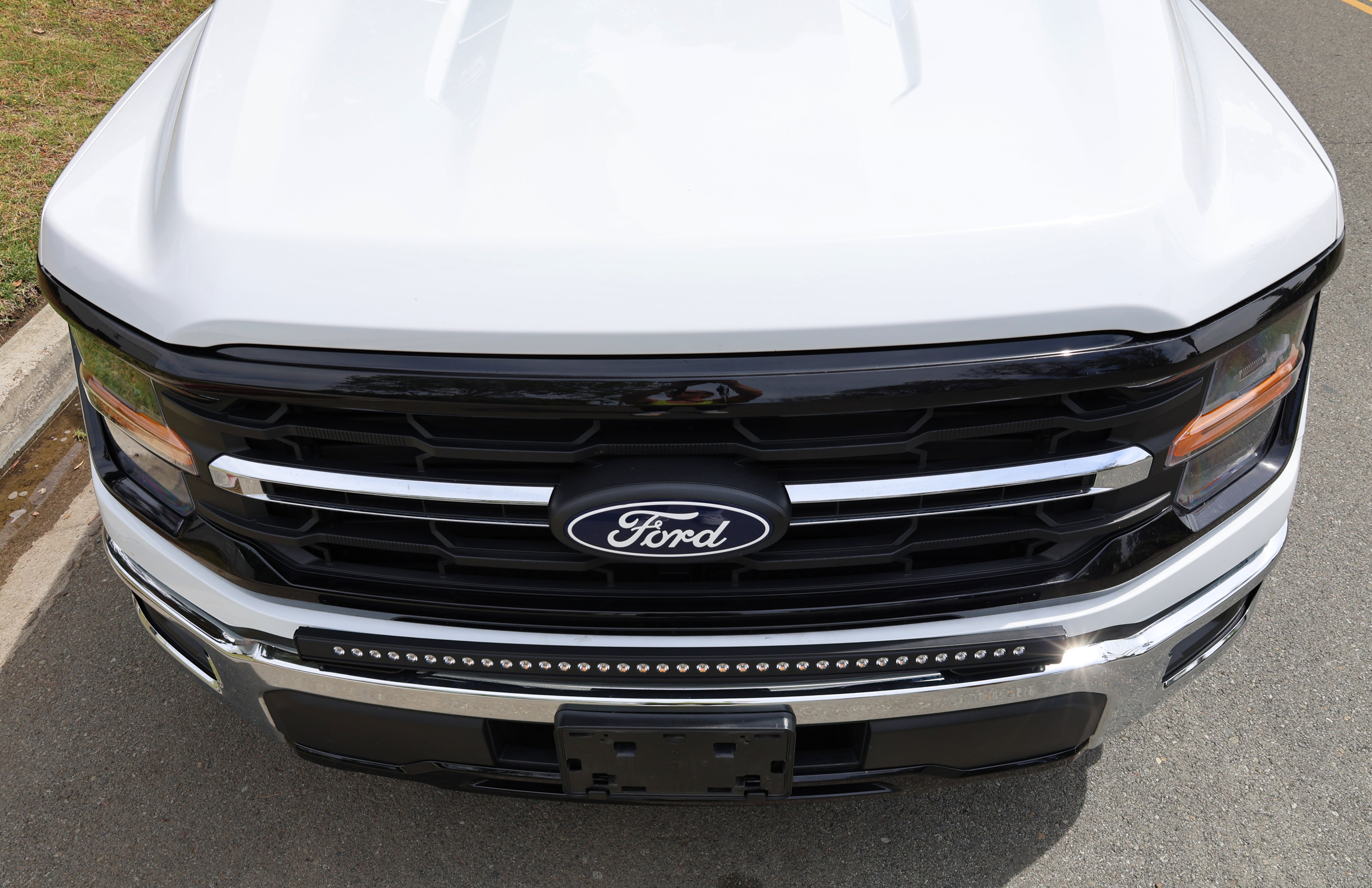 2024+ Ford F150 LightBar installed on front grille, showcasing sleek design and functionality.
