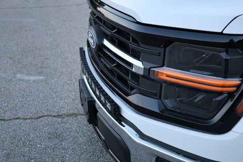 2024+ Ford F150 LightBar installed on a white Ford F150 with non-modular bumper, showcasing sleek design.