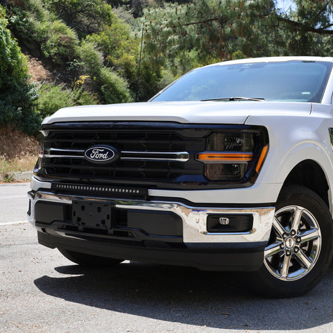 2024+ Ford F150 LightBar installed on a silver Ford F150, enhancing front visibility for off-road use.