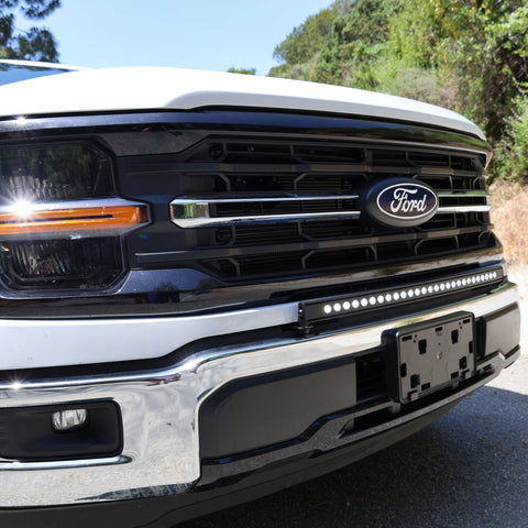 2024+ Ford F150 LightBar installed on a Ford F150 grille, showcasing its sleek design and off-road functionality.