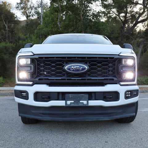 Front view of a 2023 Ford Super Duty F250 with fog lights, showcasing Ford Super Duty Fog Lights.