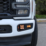 Ford Super Duty Fog Lights installed on a 2023 Ford F250 front bumper with illuminated fog lights.