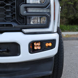 Ford Super Duty Fog Lights installed on a 2023 Ford F250 front bumper with illuminated fog lights.